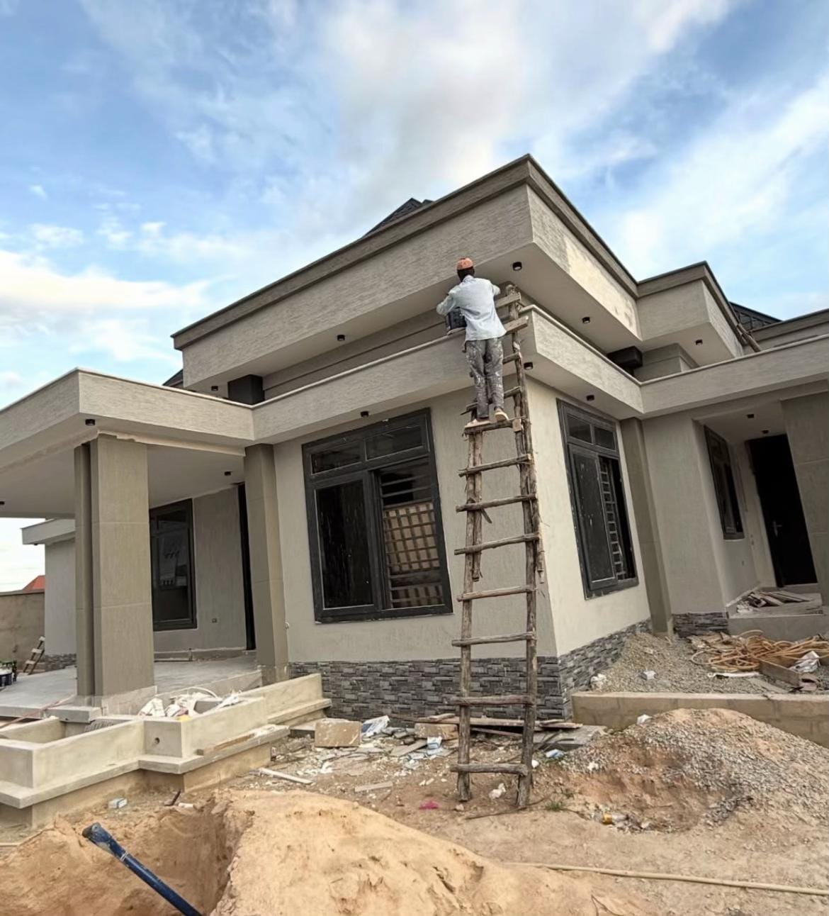 Plastering and finishing work on a modern residence